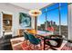 Elegant dining room with city views and modern decor at 1065 Peachtree Ne St # 3102, Atlanta, GA 30309