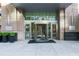 Modern building entrance with revolving doors at 1065 Peachtree Ne St # 3102, Atlanta, GA 30309