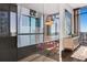 Modern kitchen with stainless steel appliances and dark cabinetry at 1065 Peachtree Ne St # 3102, Atlanta, GA 30309