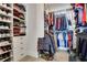 Large walk-in closet with ample shelving and hanging space at 1065 Peachtree Ne St # 3102, Atlanta, GA 30309
