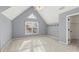Bedroom features light-blue walls, carpeted floor, vaulted ceiling, window and closet at 3300 Greencastle Chase Ne, Marietta, GA 30062