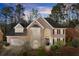 Beautiful brick home with manicured landscaping, mature trees and an attached two-car garage at 3300 Greencastle Chase Ne, Marietta, GA 30062