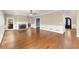 Living room with hardwood floors, fireplace, large windows, and access to the front entryway at 3300 Greencastle Chase Ne, Marietta, GA 30062