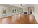 Living area with hardwood floors, fireplace, and access to the outdoor deck through sliding doors at 3300 Greencastle Chase Ne, Marietta, GA 30062