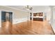 Open living space with hardwood floors and access to the kitchen and blue accent room at 3300 Greencastle Chase Ne, Marietta, GA 30062