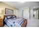 Bedroom with plush carpet and a view of the hallway at 770 Westwind Ln, Alpharetta, GA 30005