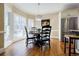 Charming breakfast nook with a round table and built-in window seat at 770 Westwind Ln, Alpharetta, GA 30005