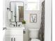 Small bathroom with white vanity, black matte fixtures and patterned shower curtain at 185 Marion # B, Atlanta, GA 30307