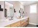 Bathroom with dual sinks, quartz countertops, and modern fixtures at 185 Marion # B, Atlanta, GA 30307