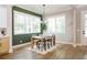 Light and bright dining area with an accent wall at 185 Marion # B, Atlanta, GA 30307