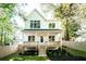 Two-story white farmhouse with a wrap-around porch at 185 Marion # B, Atlanta, GA 30307