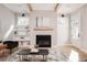 Living room with fireplace, hardwood floors, and neutral colors at 185 Marion # B, Atlanta, GA 30307