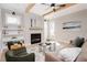 Bright living room featuring a fireplace and built-in shelving at 185 Marion # B, Atlanta, GA 30307