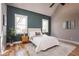 Main bedroom with wood floors, accent wall and ample natural light at 185 Marion # B, Atlanta, GA 30307