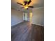 Spacious bedroom with ceiling fan and luxury vinyl plank flooring at 2002 Country Park Se Dr, Smyrna, GA 30080