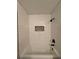 Clean shower with white subway tile and a decorative niche at 2002 Country Park Se Dr, Smyrna, GA 30080