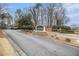 Entrance to Country Park Condominiums, featuring community signage and landscaped grounds at 2002 Country Se Dr, Smyrna, GA 30080