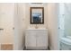 Simple bathroom featuring a white vanity and mirror at 3276 Rollingbrook Way, Duluth, GA 30096