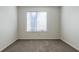 Bright bedroom with window and neutral wall colors at 3276 Rollingbrook Way, Duluth, GA 30096