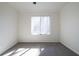 Well-lit bedroom with window and carpet at 3276 Rollingbrook Way, Duluth, GA 30096