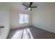 Bright bedroom with ceiling fan and carpet at 3276 Rollingbrook Way, Duluth, GA 30096