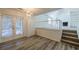 Dining area with hardwood floors and French doors at 3276 Rollingbrook Way, Duluth, GA 30096