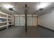 Two-car garage with storage shelving at 3276 Rollingbrook Way, Duluth, GA 30096