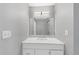 Bathroom with vanity, marble countertop, and a large mirror at 3488 Shepherds Path, Decatur, GA 30034