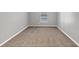 Spacious bedroom with neutral walls and brown carpet at 3488 Shepherds Path, Decatur, GA 30034