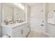 Modern bathroom with double vanity, shower/tub combo, and white subway tile at 1184 Warner Park Ct, Decatur, GA 30033