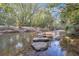 Serene creek with stone pathway, offering a peaceful natural setting at 1184 Warner Park Ct, Decatur, GA 30033