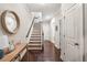 Bright entryway with staircase, hardwood floors, and console table at 1184 Warner Park Ct, Decatur, GA 30033