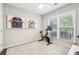 Home gym with exercise bike and framed artwork at 1184 Warner Park Ct, Decatur, GA 30033