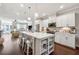 Modern kitchen with white cabinets, stainless steel appliances, and an island at 1184 Warner Park Ct, Decatur, GA 30033