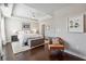 Main bedroom with king bed, walk-in closet, and hardwood floors at 1184 Warner Park Ct, Decatur, GA 30033