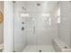 Large walk-in shower with glass enclosure and built-in seat at 1184 Warner Park Ct, Decatur, GA 30033