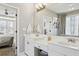 Double vanity bathroom with view into bedroom at 1263 Irwin Lake Way, Marietta, GA 30064