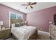 Spacious bedroom with a queen-size bed and plenty of natural light at 1263 Irwin Lake Way, Marietta, GA 30064