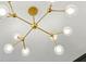 Elegant gold chandelier with clear glass globes at 1263 Irwin Lake Way, Marietta, GA 30064