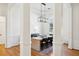 View of dining room from entryway, showing hardwood floors and chandelier at 1263 Irwin Lake Way, Marietta, GA 30064