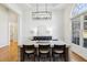 Spacious dining area with large window and modern chandelier at 1263 Irwin Lake Way, Marietta, GA 30064