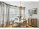 Bright dining room with white table and chairs at 1263 Irwin Lake Way, Marietta, GA 30064