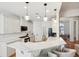 Modern kitchen with white cabinets and quartz countertops at 1263 Irwin Lake Way, Marietta, GA 30064