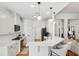 Modern kitchen with white cabinets and quartz countertops at 1263 Irwin Lake Way, Marietta, GA 30064