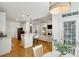 Modern kitchen with breakfast bar and view to living room at 1263 Irwin Lake Way, Marietta, GA 30064