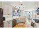 Modern kitchen with white cabinets and quartz countertops at 1263 Irwin Lake Way, Marietta, GA 30064