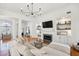 Modern living room with sectional sofa and built-in shelving at 1263 Irwin Lake Way, Marietta, GA 30064