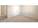 Spacious bedroom with double doors and carpet flooring at 2375 Morgan Farm Dr, Buford, GA 30519