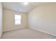 Charming bedroom with vaulted ceiling and window at 2375 Morgan Farm Dr, Buford, GA 30519