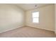 Bright bedroom with neutral walls and carpet at 2375 Morgan Farm Dr, Buford, GA 30519